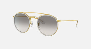 RAY-BAN ROUND DOUBLE BRIDGE POLISHED GOLD/CLEAR GREY, 51